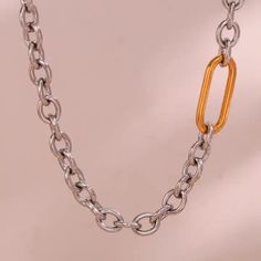 Perfect for any occasion. Its subtle elegance makes it an ideal complement to both casual and formal attire, while the adjustable length ensures a customized fit. Make a statement with the Ada Chain Necklace, a must-have addition to your jewelry collection. Item Details: 18kt Gold Plated Stainless Steel Water-Resistant Hypoallergenic Color: Coloration in the product may slightly vary due to lighting with photography. Please allow 48-72 hours to process your order before we prepare shipment, EXCL Stainless Steel Chain Necklace, Subtle Elegance, Formal Attire, 72 Hours, Chain Choker, Steel Water, Stainless Steel Chain, Free Jewelry, Ring Bracelet