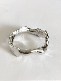 This is what I would call,  one of a kind ring, because each band  is unique and different from the other, maybe similar but never the same, they are around 5 grams,  solid bands in sterling silver, comfortable and easy to wear. We are offering many sizes including quarter of sizes. Silver Clay Rings, Silver Clay Ring, Silver Chunky Rings, Wax Carved Ring, Wax Carving Jewelry, Handmade Silver Rings, Silver Metal Clay, Abstract Jewelry, Edgy Jewelry