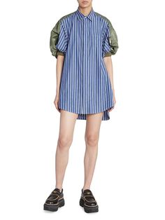 "Find SACAI Nylon Twill & Cotton Shirtdress on Editorialist. Blended both nylon twill and poplin cotton, Sacai's maximalist-style shirtdress features a spread collar and puff short sleeves. Spread collar Short puff sleeves Chest patch pocket Concealed button-front closure 65% polyester/35% nylon Combo: 100% cotton Trim: 50% cotton/50% polyester Lining: 100% cotton Dry clean Made in Japan SIZE & FIT Model measurements: 5'10\" tall Model is wearing a US size 4 This brand fits slightly larger. Cons Summer Workwear Shirt Dress With Puff Sleeves, Summer Puff Sleeve Shirt Dress For Work, Spring Workwear Shirt Dress With Gathered Sleeves, Summer Shirt Dress With Gathered Sleeves For Work, Spring Shirt Dress With Gathered Sleeves For Work, Chic Summer Shirt Dress With Cuffed Sleeves, Chic Spring Shirt Dress With Gathered Sleeves, Spring Chic Shirt Dress With Gathered Sleeves, Summer Daywear Shirt Dress With Cuffed Sleeves