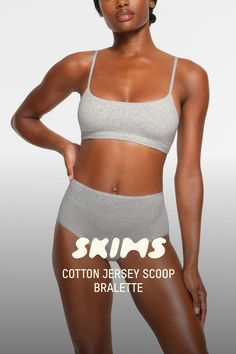 This is one bra you’ll never want to take off. In our ultra soft and lightweight jersey fabric, this scoop neck bralette features an elastic band and hook-free design for a comfortable fit. Perfect for layering or wearing on its own. | SKIMS Scoop Bralette | Grey | Small | Cotton Jersey Fitted Scoop Neck Bra For Loungewear, Seamless Elastane Crop Top For Loungewear, Stretch Scoop Neck Sports Bra For Loungewear, Stretch Cotton Seamless Bra, Seamless Stretch Cotton Bra, Cotton Stretch Seamless Bra, Cotton Seamless Stretch Bra, Cotton Stretch Sports Bra With Adjustable Straps, Scoop Neck Sports Bra With Adjustable Straps For Loungewear