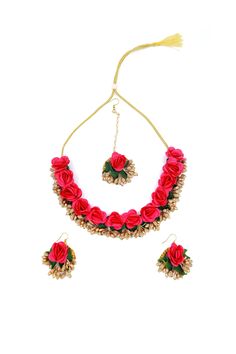 a necklace and earring set with red roses