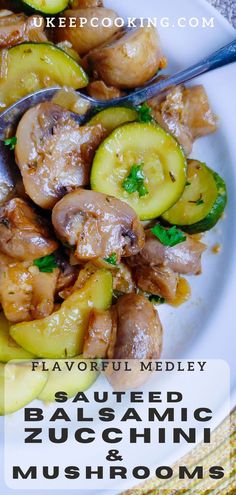 a white plate topped with sliced cucumbers and mushrooms next to a fork on top of a table