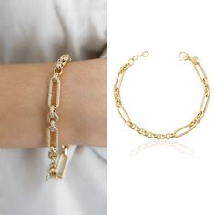 "We present our stunning 14K Gold Chain Bracelet, a symbol of luxury and elegance. This bracelet is made of superior quality 14K gold, featuring a timeless link design that never goes out of style. Secured by a durable lobster clasp, this bracelet is suitable for both men and women and is perfect for any occasion. Its polished finish adds sophistication and charm to your outfit. Wear it alone or stack it with other bracelets, our 14K Gold Chain Bracelet is sure to make a statement. It is an idea Gold Diamond Link Bracelet With Adjustable Chain, Gold Diamond Bracelet With Cable Chain, Luxury Cable Chain Diamond Bracelet Gift, Luxury Diamond Bracelet With Cable Chain As Gift, Luxury Gold Diamond Paperclip Bracelet, Elegant Gold Diamond Paperclip Bracelet, Gold Chain Diamond Bracelets, Diamond Cable Chain Bracelet As Gift, Gold Tennis Bracelet For Gifts With Durable Links