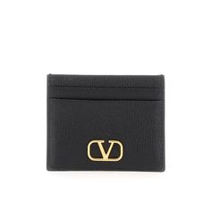 Valentino Garavani Card Holder In Grainy Calfskin Leather, With Antique-Brass Finish Vlogo Application. Four Card Slots And One Flat Pocket. Materal: 100% Calfskin. Made In: Italia. Color: Black. Collection: Fall - Winter 2023. Sku: 3w2p0v32snp. Width: 10 Cm Height: 8 Cm. Modecraze Is An Online Platform That Offers The Best Designer Products From Europe To Customers All Over The World. Our Exclusive Partnerships With European Retailers Ensure That We Curate A Wide Selection Of Authentic Designer Elegant Leather Card Holder With Logo, Elegant Formal Wallets With Logo, Elegant Business Wallets With Logo, Elegant Business Wallet With Logo, Elegant Black Card Holder With Logo Plaque, Valentino Wallet, White Studs, Pink Studs, Card Pouch