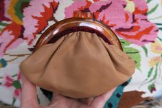 Vintage coin purse in fabric-lined calfskin with plastic or bakelite closure. Label: A "Budd leather" creation, Genuine leather Beautiful used condition, very clean. Closes well. Size of a large wallet. Width 16 cm, height 14 cm, thickness 3 cm. Net weight 61 gr. You will be able to see our other vintage objects on the following page and refine your search using the drop-down menu: https://www.etsy.com/fr/shop/UneMadeleineDeProust?ref=seller-platform-mcnav 🔴 FOREIGN BUYERS (OUTSIDE THE EUROPEAN COMMUNITY), PLEASE TELL US YOUR PHONE NUMBER, WITHOUT THIS INFORMATION, WE CANNOT SEND YOUR ORDER, THANK YOU 🔴 Sending in "Letter" format with tracking number. If you want another type of shipment for compensation in the event of loss or for a group shipment, please contact us BEFORE purchase to r Vintage Leather Pouch With Coin Pocket, Formal Compact Leather Clutch, Classic Brown Pouch With Leather Lining, Classic Brown Leather-lined Pouch, Leather Clutch Coin Purse For Formal Events, Compact Brown Leather Bag, Classic Brown Pouch With Coin Pocket, Compact Brown Bags With Coin Pocket, Leather Beige Coin Purse