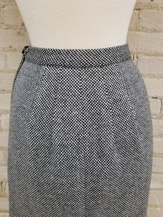 "1950s lovely black and white checked wool pencil skirt. This skirt is made of quite thick weight wool (burn test confirmed wool). The skirt closes with a 7\" Dart brand side metal zipper, with a thick black button. The skirt has 2 darts on either side on the front below the waist band and a really cool 4 dart span on the center back (see photo 6). There is lining on half of the back side of the skirt. This lining had a tear which I have secured with interfacing. Excellent condition with no issu Fitted Tweed Pencil Skirt, 50s Pencil Skirt, 1950s Pencil Skirt, 1950s Skirt, Tweed Pencil Skirt, Cotton Sundress, Wool Pencil Skirt, 1940s Dresses, Rayon Dress