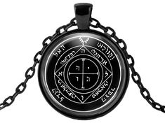 Choose from the 44 King Solomons Seals Seals. The Talisman is 1" round, in solid black, with a black stainless steel 24" inch necklace chain.A Gift box is included! Each piece of jewelry is made of alloy metal, enamel-coated solid black, featuring the artwork sigil under a glass dome and Handmade by designer Angeline. Optional free custom sizing for all chain necklaces by request at checkout! Optional custom gift notes available by request at checkout! Symbolic Black Medallion Necklace, Black Spiritual Medallion Jewelry, Spiritual Black Medallion Jewelry, Black Symbolic Medallion Jewelry, Black Symbolic Pendant Jewelry, Symbolic Black Necklace With Adjustable Chain, Symbolic Black Round Jewelry, Symbolic Black Pendant Necklace, Symbolic Black Stainless Steel Necklace