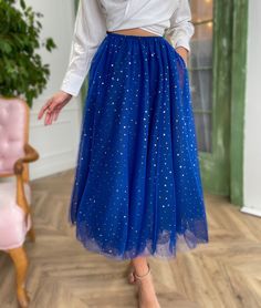 Delicate fabrics are layered and embellished with shimmering stars in classy midi length skirts. Easy to wear and layer, yet forever statement pieces, these skirts will upgrade your look for any event. Tool Skirt, Teuta Matoshi, Midi Length Skirts, Disney Outfits, All About Fashion, Western Fashion, Midi Length, Pink Roses, Statement Pieces