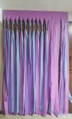 purple and blue curtains hanging on the wall