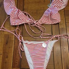 Forever 21 White And Red Striped Ruffle Bikini Set. Size S. Ruffles On The Cups And Over The Shoulders. The Ties Are Super Long So You Could Tie It In Front Or Wrap Them Around And Tie Them In The Back. Adjustable Shoulder Straps. Super Cute. It Has Pockets So You Could Add Your Own Pads If You Would Like. Trendy Fitted Swimwear With Ruffles, Red Ruffled Swimwear For Vacation, Striped Swimwear With Ruffles For Beach Season, Striped Ruffled Swimwear For Beach Season, Red Ruffled Swimwear For Beach Season, Striped Ruffled Swimwear For Poolside, Striped Ruffled Swimwear For Beach, Red Ruffled Swimwear For Beach, Red Ruffled Swimwear For Beachwear