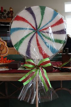 a candy lollipop sitting on top of a table