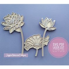 two paper cut lotus flowers on a blue background with the text svg laser cut lotus