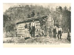 an old black and white photo of people standing in front of a log cabin