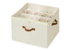 a white storage box filled with lots of items