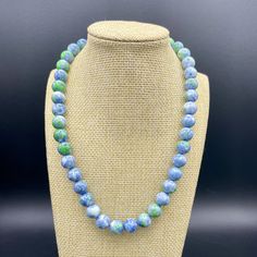 Blue and Green are perfect for Spring! Choose which necklace you would like, Blue and Green Jade or all Light Blue Aquamarine gemstones. Necklace length is approximately 17-18 inches long and has a gold tone toggle clasp. Would like to have a matching bracelet set as well? Click here and take a look at our matching Spring Fling bracelet stack! https://www.etsy.com/listing/1694995173/green-blue-spring-fling-bracelet Materials: 10mm Blue and Green Rain Flower Jade beads 10mm Aquamarine Rondelle shaped gemstones Large gold colored toggle clasp Photos show White Neutral Shell necklace sections. Please view that listing for those beaded necklace style options. Please note that natural gemstones vary in color and textures. No two gemstones or beads are alike, which makes this bracelet unique! If Beaded Necklace Green, Flower Jade, Bracelet Materials, Necklace Matching, Blue Spring, Necklace Green, Spring Fling, Matching Bracelet, Blue Springs