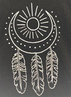 a black and white drawing of a dream catcher with feathers on it's side