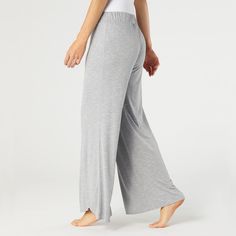 Slip into ultimate comfort and endless relaxation with our Easy Days Relaxed Pant. This lightweight lounge essential is designed to be loose-fitting and features an elastic waistband for a perfect, effortless fit. Enjoy the feeling of freedom and tranquility. Materials: Viscose/Polyester/Spandex. Loungewear Ankle-length Yoga Pants With Elastic Waistband, Full-length Loungewear Bottoms With Elastic Waistband, 4-way Stretch Sweatpants With Elastic Waistband For Loungewear, Elastic Waistband Ankle-length Loungewear Pants, Comfortable Wide-leg Sleepwear With Elastic Waistband, Poncho Jacket, Relax Pants, Lounge Top, Easy Day