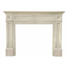 a white fireplace with a mantel on the top and bottom, in an antique style