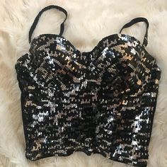 New Beautiful Marciano Silver/Black Sequin Bustier, Not Itchy Or Scratchy On Skin. Purchased At Marciano Store. Quality Sequin, Feels Like Metal Sequin Not Plastic. Smoke Free Home *I Have Other Marciano Listings Serious Buyers, No Holds Or Trades. Thank You For Browsing My Closet 10% Off When You Buy 2 Or More Items From My Closet Glamorous Fitted Metallic Tank Top, Metallic Fitted Tank Top For Night Out, Fitted Shimmer Tank Top For Party, Fitted Shimmer Tank Top For Night Out, Glamorous Fitted Shimmer Tank Top, Glamorous Silver Tank Top For Party, Glamorous Silver Party Tank Top, Glamorous Fitted Tank Top With Built-in Bra, Glamorous Silver Tank Top For Night Out