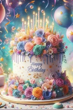 a birthday cake decorated with flowers and candles