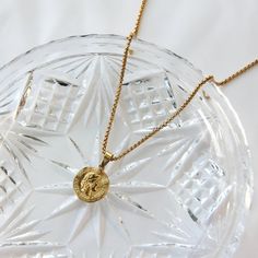 A stylish and casual stainless steel gold coin pendant necklace that will keep its color for a long time when handled with care, perfect for everyday wear and that is safe for your sensitive skin. 💎Free shipping on all orders💎Packaging that is ready to offer as a gift💎Customizable and adjustable chain length The gold coin pendant necklace, a great necklace for daily wear This coin pendant necklace is a great way to express your style. It is trendy and versatile, you can wear it as part of any Gift Medallion Necklace With Gold Chain, Gift Round Medallion Necklace With Gold Chain, Round Medallion Necklace With Gold Chain As Gift, Gold Chain Medallion Necklace As Gift, Gold Chain Medallion Necklace, Gold-plated Medallion Necklace With Gold Chain As Gift, Gold Plated Medallion Necklace With Gold Chain As Gift, Gold Plated Coin Chain Necklace With Tarnish Resistance, Yellow Gold Coin Chain Necklace Gift