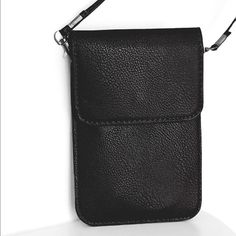 Black Snap Closure Removable Crossbody Strap Measures 7.25” X 4.75” Trendy Black Phone Bag, Black Faux Leather Phone Bag For Daily Use, Daily Use Faux Leather Phone Bag, Faux Leather Phone Bag For Daily Use, Portable Faux Leather Phone Bag For Daily Use, Black Faux Leather Shoulder Bag With Cell Phone Pocket, Black Leather Phone Bag, Black Leather Portable Phone Bag, Black Phone Bag For Daily Use