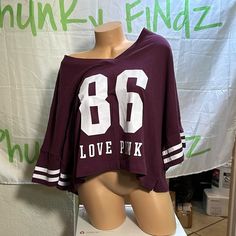 Size Xxl Victorias Secret Pink Short Sleeve Cropped V-Neck Oversized Tee Shirt Maroon Sporty V-neck T-shirt For Fall, Sporty V-neck Tops For Loungewear, Sporty Oversized V-neck Top, Oversized V-neck Top With Letter Print, Oversized V-neck Sporty T-shirt, Oversized Sporty V-neck Top, Sporty Oversized V-neck T-shirt, Victoria's Secret Summer Tops With Short Sleeves, Oversized Sporty V-neck T-shirt