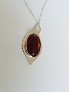 "this beautiful red carnelian is settle on a Silver tear drop hand made with sterling silver, it has a loop that can be used as bail. The stone is 18 x 25 mm and the teardrop is 0.8 mm thick, the chain is 16 inches and 1 mm thick This a special design matches with the carnelian rings that you can see in these links: http://etsy.me/1Tzy0fP http://etsy.me/1TyuVSF *This jewel will be sent to you in a gift box * All the pieces are Hand Made * Custom order We will be glad to make any size, style, oth Polished Oval Carnelian Jewelry, Oval Carnelian Jewelry With Polished Finish, Carnelian Gemstone Oval Pendant, Carnelian Gemstone Oval Pendant Jewelry, Carnelian Oval Cabochon Gemstone Jewelry, Oval Red Necklace With Polished Finish, Red Oval Carnelian Necklace, Oval Red Carnelian Jewelry, Red Carnelian Oval Necklace