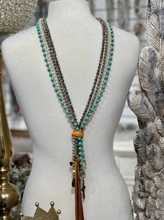 Turquoise Beaded Chain Lariat Necklace, Turquoise Lariat Necklace With Beaded Chain, Elegant Turquoise Beaded Lariat Necklace, Elegant Long Beaded Turquoise Necklace, Bohemian Turquoise Necklaces, Turquoise Lariat Beaded Necklaces, Turquoise Beaded Chain Long Necklace In Bohemian Style, Turquoise Necklace With Round Beaded Chain, Turquoise Beaded Chain Long Necklace