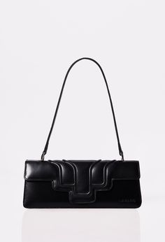 Front of a Black Leather Shoulder Flap Bag Hilda with a raised design flap and Lazaro logo. Elegant Black Shoulder Bag With Leather Trim, High-end Black Top Handle Flap Bag, High-end Black Shoulder Flap Bag, Black Leather Trim Flap Shoulder Bag, Leather Lanyard, Luxury Black Leather-lined Clutch, Accent Chair Bedroom, Shoe Storage Shelf, Daybed Covers