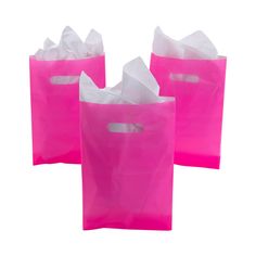 three pink shopping bags with white handles