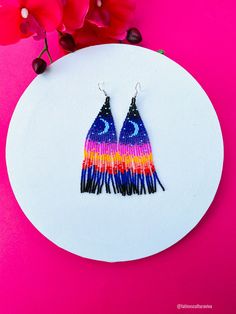 These beautiful beaded earrings are so colorful and perfect for all-day wear. They are definitely the perfect accessory to style up your look and add personality to your outfit. These lovely handmade earrings are made with sterling silver hooks and colorful beads. Each pair of earrings that we sell is authentic and one-of-a-kind! Finds more styles at https://www.etsy.com/shop/LatinxsCulturaViva?ref=simple-shop-header-name&listing_id=990207426&section_id=26730499 Thank you so much for vis Artsy Multicolor Round Bead Earrings, Artistic Colorful Beaded Earrings As Gift, Artistic Colorful Beaded Earrings For Gifts, Artistic Earrings With Colorful Beads As Gift, Artistic Earrings With Colorful Beads For Gift, Artistic Dangle Earrings With Colorful Beads, Artistic Multicolor Round Bead Earrings, Whimsical Multicolor Festival Earrings, Multicolor Whimsical Earrings