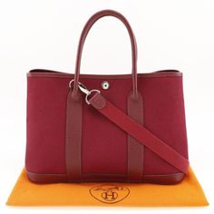 Store Item No. I191923006 Item Handbag Brand Hermes Model Name Garden Party Tpm Gender Women Material Tower Ash/Buffl Color Rouge Imperialred / Silverhardware Size(Cm) H:20cm X W:30cm X D:13cm Handle Height10cm Shoulder110cm Size(Inch) H:7.9 X W:11.8 X D:5.1inch Handle Height3.9inch Shoulder43.3inch Weight 403g Country Of Manufacture France Engraving J Specification Closing Ceremonyopen Bag Typediagonally Hung2way Accessories Storage Bagsshoulder Strap Condition Rank B+ Exteriorminor Stainrubbedcorner Thread Handleminor Stain Condition Rank N New Brand New With Tags. S New / Unused New Item, But May Have Insignificant Scratches Or Slight Discoloratio Hermes Garden Party, Red Leather Handbags, France Design, Party Handbags, Buffalo Leather, Colorful Party, Branded Handbags, Accessories Storage, Font Size