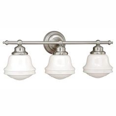 three light bathroom fixture with white glass shades