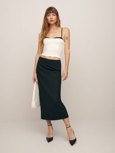 Let your skirt do the talking. Shop the Nala Skirt from Reformation,  a fitted column midi skirt. Column Skirt, Swimwear Dress, New Tops, Outerwear Sweater, Linen Clothes, Vintage Linens, Skirt Pants, Fabric Care, Womens Bottoms