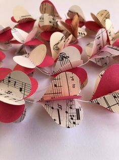 some paper hearts with musical notes on them