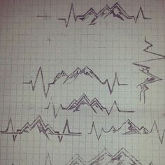 several different types of mountains and lines drawn on a sheet of paper with grids