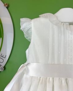 A gorgeous off-white dress for special occasions, made with a lightweight English muslin fabric and laces. It has buttons on the back for closure and a bow. Dry clean Lining: 100% cotton Made in Spain Final Sale, no exchanges nor returns are accepted Girls Christening Dress, Baptism Dresses, Girls Baptism Dress, Christening Dresses, Spanish Fashion, First Communion Dresses, Girl Christening, Baptism Dress, Off White Dresses