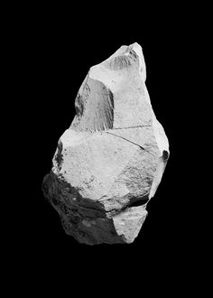 a large rock is shown against a black background