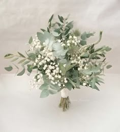 Bridal bouquets White And Green Wedding Bouquet Eucalyptus, Bridesmaid Bouquet Eucalyptus White, Natural Wedding Bouquet Simple, Bridesmaids Greenery Bouquet, Rosemary And Eucalyptus Wedding, Winter Wedding Bouquet Simple, Small Bridesmaid Bouquet Greenery, Bridesmaid Bouquet Vs Bride Bouquet, Greens Bouquet Wedding