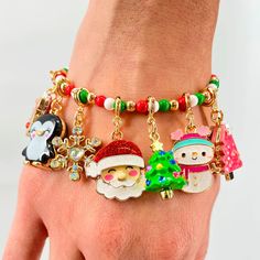 Deck this bracelet with charms and more charms to celebrate the most wonderful time of the year! Charmable stretch bead bracelets... wear one or stack for tons of fun. Add charms to this bracelet and customize her collection! 6" length Base Metal, Enamel Coating WARNING: Choking Hazard - Small parts. Not for children under 3 years. Gold Pink Christmas Tree, Panda Charm, Custom Charm Bracelet, Charm It, Cupcake Charms, Christmas Tree Charm, Gold Snowflake, Pink Christmas Tree, Gold Christmas Tree