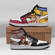 one piece shoes with anime characters painted on the upper and bottom, sitting on top of a cardboard box