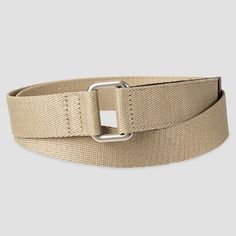 Complete your look with this stretch fabric belt by Goodfellow & Co that is sure to make a great addition to your everyday wardrobe. The woven design of the stretch fabric strap adds a touch of texture to both your casual and formal ensembles, while giving you a comfortable and customizable fit with each wear. Plus, thanks to an adaptive friendly design, this belt is so easy to put on that you can use just one hand to wear and secure it in place. Adjustable Self Belt For Workwear, Adjustable Belt For Work, Casual Adjustable Beige Belt, Casual Belts For Workwear In Spring, Casual Belts For Spring Workwear, Casual Spring Belts For Workwear, Casual Spring Fabric Belt, Adjustable Casual Belt For Workwear, Casual Beige Fabric Belt