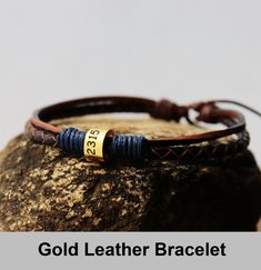 Mens Leather Bracelet, Knotted leather bracelet, gold ring, dad, Personalized, coordinate, husband, adjustable, genuine leather, father Gift Stainless Steel The unit price is for only one bracelet Looking for your exact coordinate here: https://www.latlong.net/ Custom hand stamped Bracelet, Personalized any information on the bracelet, the best gift for boyfriend or girlfriend, best friends, mom, dad etc. unisex style. Details: End: slot side adjustable to any wrists Color of the leather: Brown / Black/Navy Blue Raw materials: wax cord rope+Stainless Steel Metal color: Stainless Steel Max characters: 17 per line To see more different styles handmade bracelets, click https://www.etsy.com/shop/HandmadeTalent If you like my shop, just fav it, if you want the bracelets, you can add to your sho Gold Leather Bracelets As Gift, Gold Leather Bracelet As Gift, Gold Leather Bracelet For Gift, Adjustable Gold Leather Bracelets, Adjustable Gold Leather Bracelet Engraved, Personalized Gold Leather Bracelet As Gift, Gold Bracelet With Adjustable Waxed Cord, Personalized Gold Leather Bracelet Gift, Personalized Gold Leather Bracelet For Gift