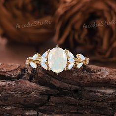 Vintage Oval Opal Engagement Ring Dainty Opal Ring Rose Gold Ring Unique Opal Cluster Ring Natural Opal Ring Leaf Ring Anniversary Gifts RING INFORMATION ★ Engagement ring ⊹Center Stone - Natural opal    Cut - Oval shaped    Size - 6*8mm     ⊹Band width - 1.3mm ⊹Metal - 14k or 18k solid gold (available in yellow, white or rose gold) ⊹Ring size - any sizes (size above 9 will be priced individually) Enter my shop: www.etsy.com/shop/ArcadiastudioUS MAKING & SHIPPING ★ Shipping ⊹It usually takes 2-3 weeks for production and 3-6 days for shipping. Free shipping within US. ⊹If you want to receive your ring sooner, rush order and shipping upgrade services are available. ★ Customized Service ⊹If you want to custom a ring, please share your idea or pictures with me. I will be really happy to work w Oval Opal Engagement Ring, Dainty Opal Ring, Opal Engagement Ring Rose Gold, Gold Ring Unique, Engagement Ring Dainty, Rose Gold Opal Ring, Unique Opal, Natural Opal Ring, Opal Engagement Ring