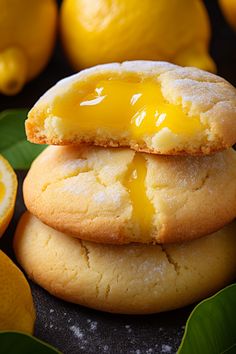 two lemon cookies are stacked on top of each other