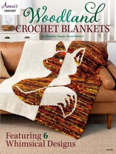 the cover of woodland crochet blankets featuring a dog on a couch with a blanket