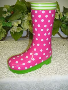 RUBBER BOOT VASE PINK WITH WHITE POKA DOTS AND GREEN ACCENTS 8" H X 6" L OPENING AT THE TOP 2" X 3" VERY GOOD CONDITION PLEASE VIEW MY OTHER AUCTIONS AND EBAY STORE.  I WOULD APPRECIATE YOUR ADDING MY STORE TO YOUR FAVORITE'S LIST.  HTTPS://stores/ebay.com/collectibles-delectables    NEW ITEMS ADDED DAILY.  THANK YOU FOR YOUR BUSINESS AND HAVE A GREAT DAY! Powered by eBay Turbo Lister The free listing tool. List your items fast and easy and manage your active items. Boot Vase, Poka Dot, Garden Fairy, Rubber Boot, Vase Vintage, Rain Boot, Green Accents, Vintage Buttons, Have A Great Day