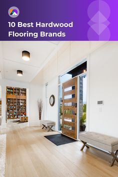 the interior of a house with hardwood floors and doors that have glass panels on them