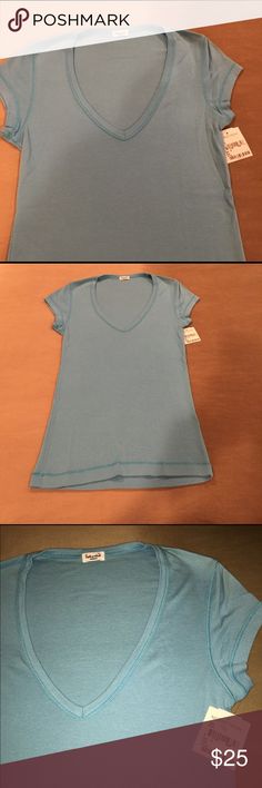 NWT Splendid Tee NWT Splendid V neck. Super soft material. Size Medium will also fit a size Small. Purchased at Nordstrom and Never worn :( Splendid Tops Tees - Short Sleeve Light Blue Fitted V-neck T-shirt, Soft Material, Tops & Tees, Nordstrom, Size Medium, V Neck, Women's Top, Women Shopping, Blue